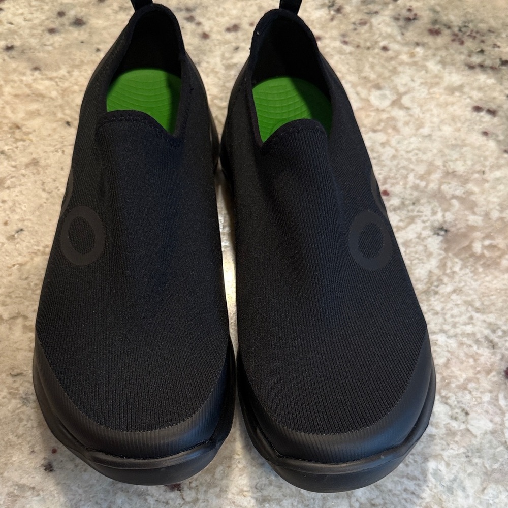 OOFOS Women's Black Slip-On Sneakers with Green Insoles